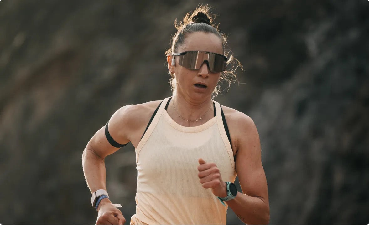  Laura Philipp - 2024 Ironman World Championship Gold running outdoors with sunglasses on a blurred natural background with Bone Headphones. Best seller 2025